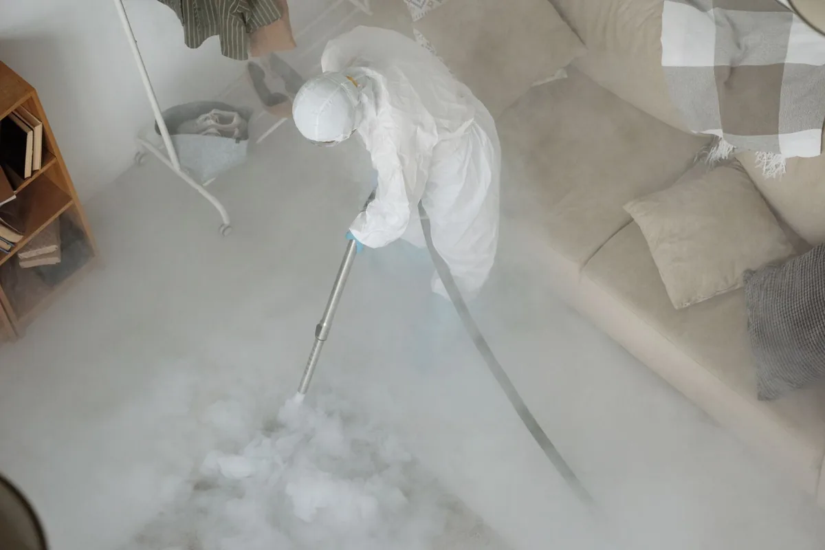 Biohazard cleanup technician in protective equipment, Orfordville, WI
